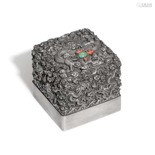 A turquoise and coral-inlaid silver `nine dragons` seal | 銀...