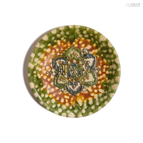 A sancai-glazed `lotus` tripod dish, Tang dynasty | 唐 三彩寳...