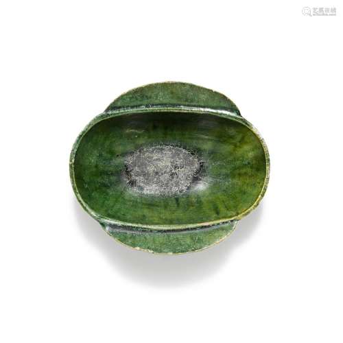 A green-glazed pottery earcup, Han dynasty | 漢 綠釉耳杯