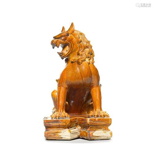 An amber-glazed figure of a lion, Tang dynasty | 唐 黃釉獅子...