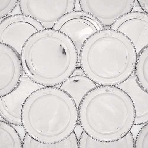 Twenty-four George III circular silver dinner plates, Wakeli...