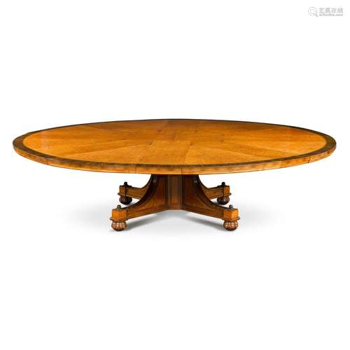 A late Victorian amboyna and mahogany circular expanding din...