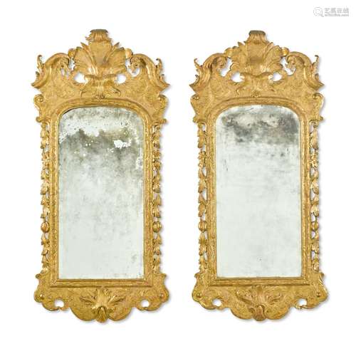 A pair of George II carved giltwood mirrors, circa 1730-40, ...