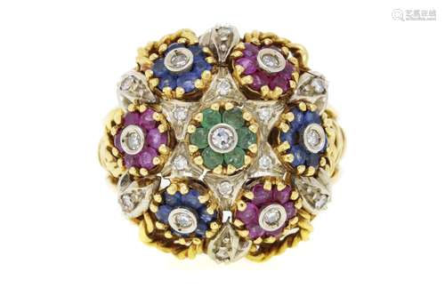 Bague bombée 2 ors 750 à motif floral sertie d`émeraudes, de...