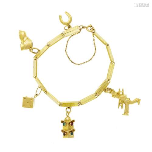 Bracelet or 750 retenant 5 charms en or 750 dont un ramoneur...