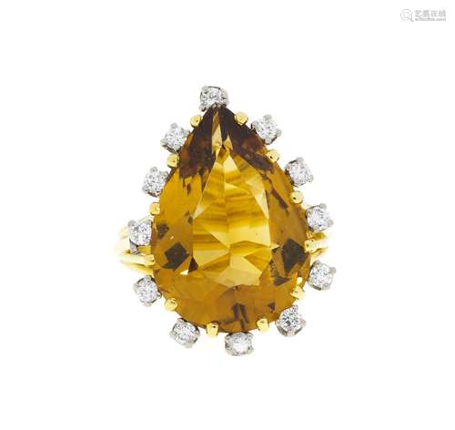 Bague 2 ors 750 sertie d`une citrine taille poire entourée d...