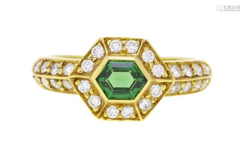 Bague or 750 sertie d`une tsavorite hexagonale et de diamant...