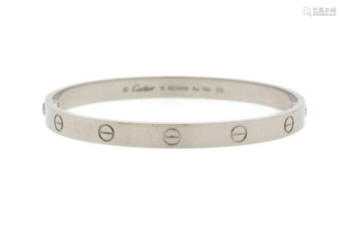 Cartier, Love, bracelet rigide or gris 750, signé, numéroté ...