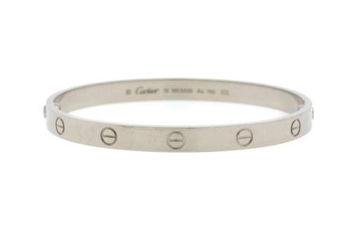 Cartier, Love, bracelet rigide or gris 750, signé, numéroté ...