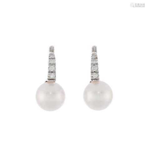 Paire de boucles d`oreilles or gris 750 sertis de lignes de ...