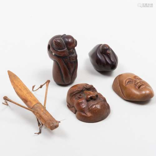 Group of Four Japanese Boxwood Netsuke and a Model of a Gras...