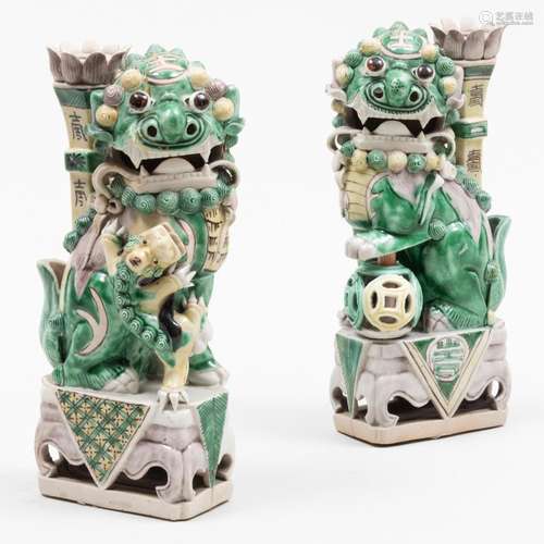 Pair of Chinese Glazed Porcelain Buddhistic Lion Candleholde...