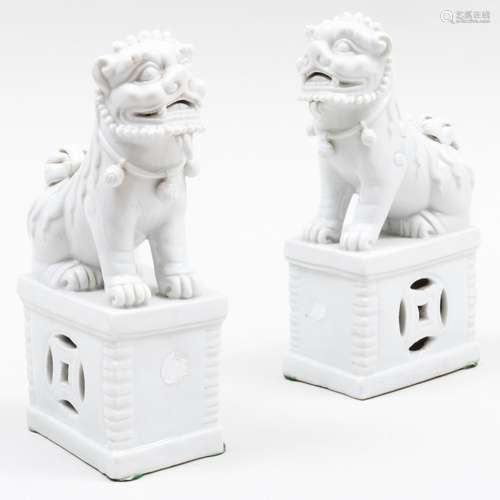 Pair of Chinese White Glazed Porcelain Buddhistic Lion Joss ...