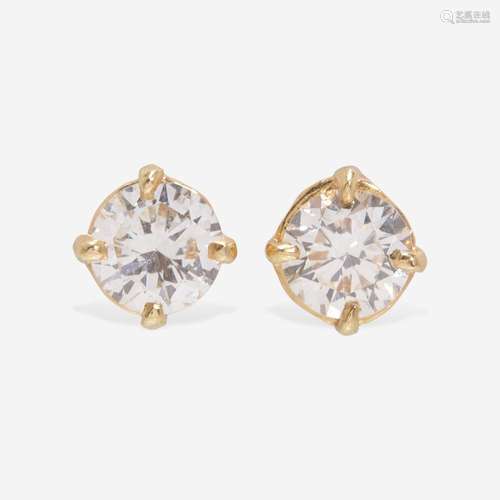 A Pair of 14K Yellow Gold Diamond Studs