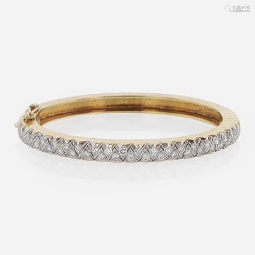 An 18K Gold and Diamond Bangle Bracelet by Carl D. Lindstrom...