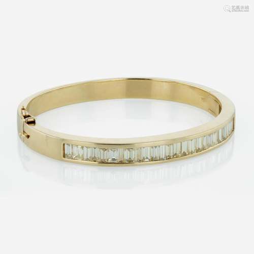 A 14K Yellow Gold and Diamond Bangle Bracelet