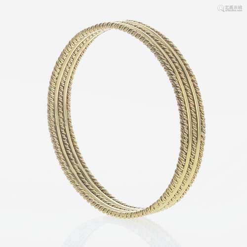 An 18K Yellow Gold Craig Drake Bangle Bracelet