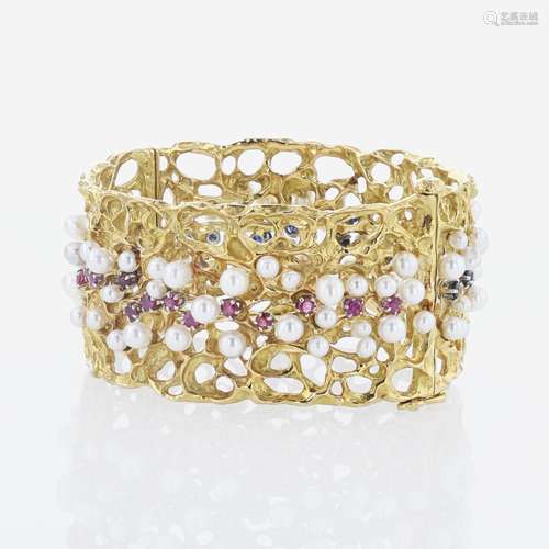 An 18K Yellow Gold and Gemstone Bangle by Karl Stittgen