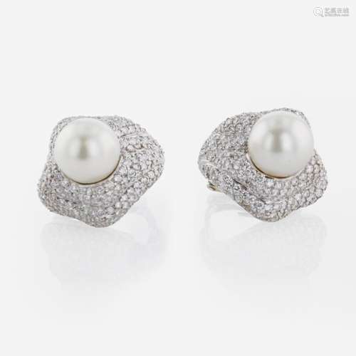 A Pair of 18K White Gold, Diamond, and Pearl Ear Clips