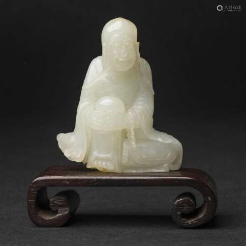 A White Jade Figure of a Luohan, Qianlong Period, 18th Cent