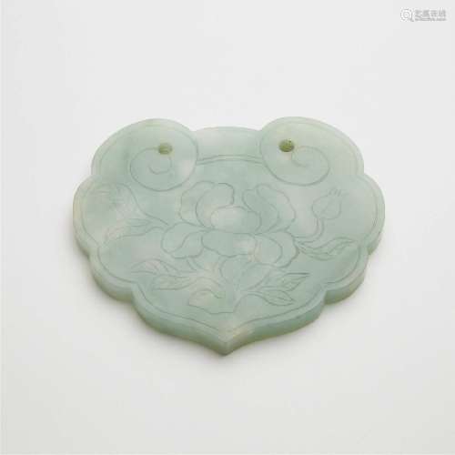 A Carved Jadeite 'Fortune and Longevity' Ruyi Lock-Shaped P