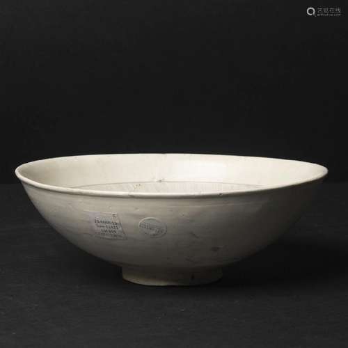 A Cizhou-Type White-Glazed Carved 'Floral' Bowl, Jin/Yuan D