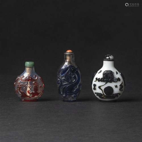 A Group of Three Overlay Peking Glass Snuff Bottles, 19th C