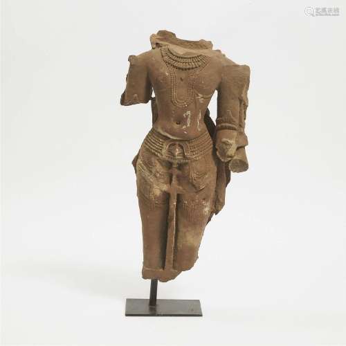 A Large Stone Torso of a Male Deity, India, 12th Century or