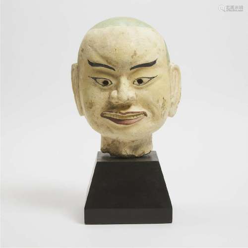A Large Painted Terracotta Head of a Monk, Vietnam, 18th Ce