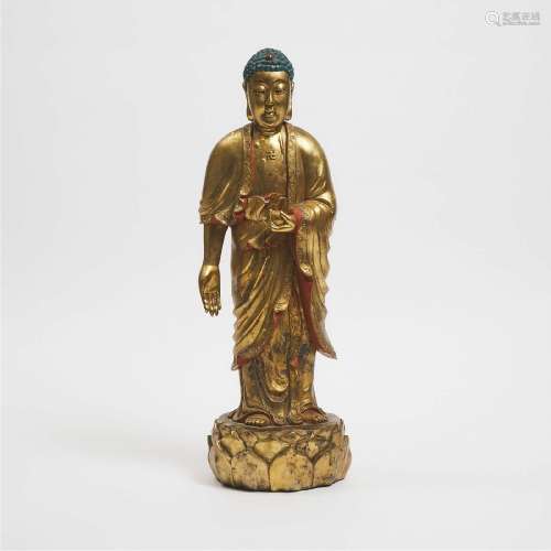 A Gilt Lacquered Wood Figure of Shakyamuni Buddha, Vietnam,