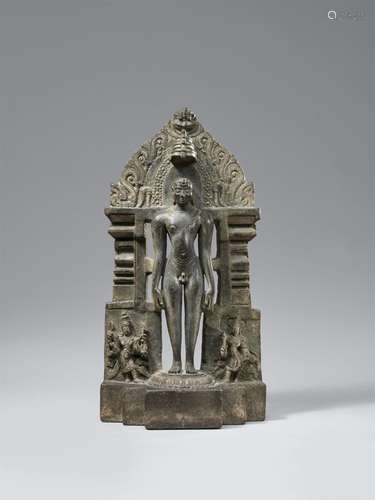 A black stone Jain stele of a tirthankara. India, Karnataka....