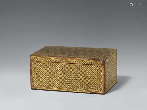 An Anglo-Indian wood and glass-inlaid box with a hinged lid....