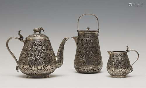 A Lucknow jungle pattern silver tea and coffee set. Northern...