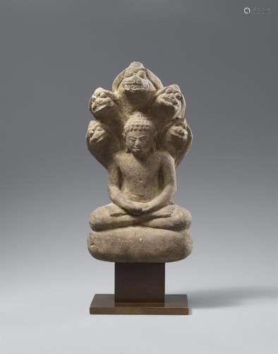 A small Mon stone Buddha Muchalinda. Thailand, Mon-Dvaravati...