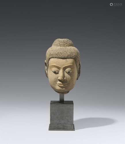 An Ayutthaya sandstone head of a Buddha. Thailand. 15th cent...