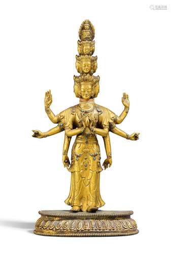 A gilt bronze figure of the eleven-headed Avalokiteshvara. T...