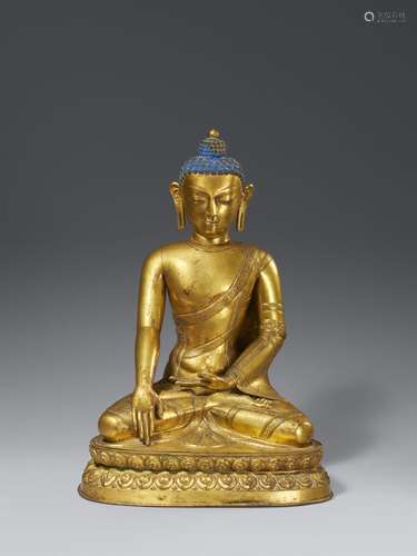 A large gilt copper repousse figure of Tathagata Shakyamuni ...