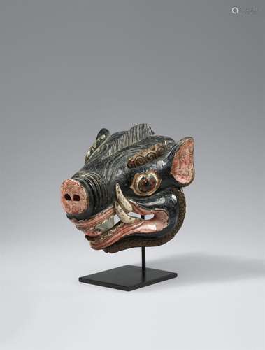 A Cham dance mask of a boar. Tibet, 18th/19th century