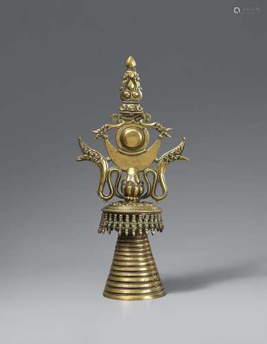 A reliquary bronze stupa (upper part). Tibet, 14th century