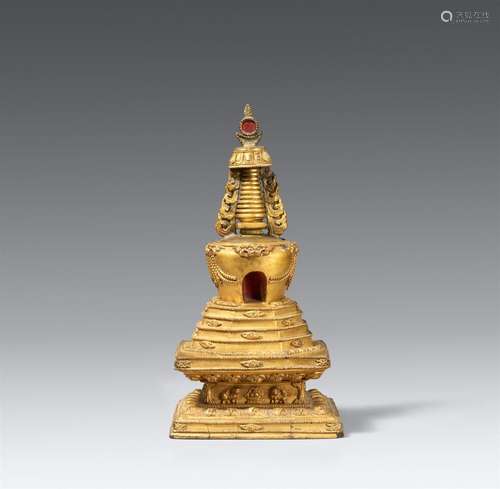 A gilt and polychromed wood stupa (mChod-rten) on a lion thr...