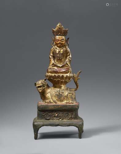 A gilded and lacquered bronze figure of a bodhisattva. Ming ...