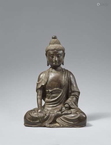A heavily cast bronze figure of Buddha Shakyamuni. Ming dyna...