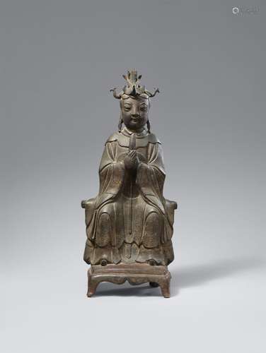 A bronze figure of the Daoist goddess Bixia Yuanjun. Late Mi...