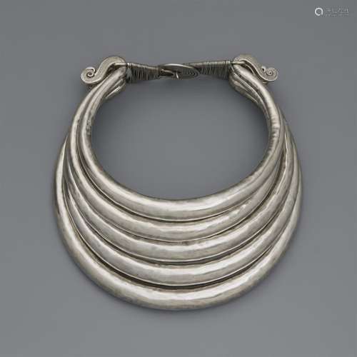 A silver neck ornament. Southern China, Northern Thailand, B...