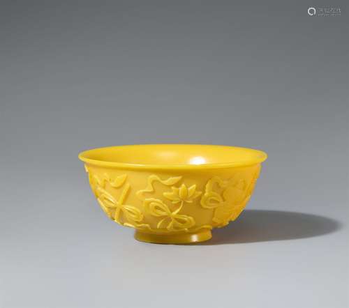 A yellow Peking glass bowl.