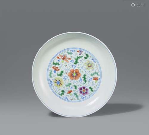 A fine and rare imperial doucai floral medallion dish. Yongz...