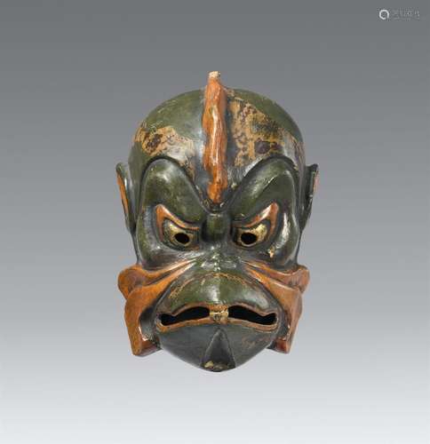 A lacquered wood gigaku mask. Meiji period