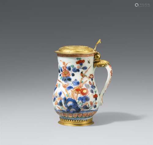 A small mounted pear-shaped Imari jug. Arita. Around 1720