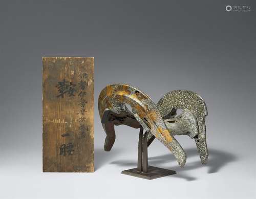 A wooden and aogai-inlaid saddle. Edo period