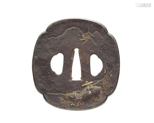 An iron tsuba. 19th century